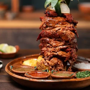 a photo of Trompo de chorizo con ranchera